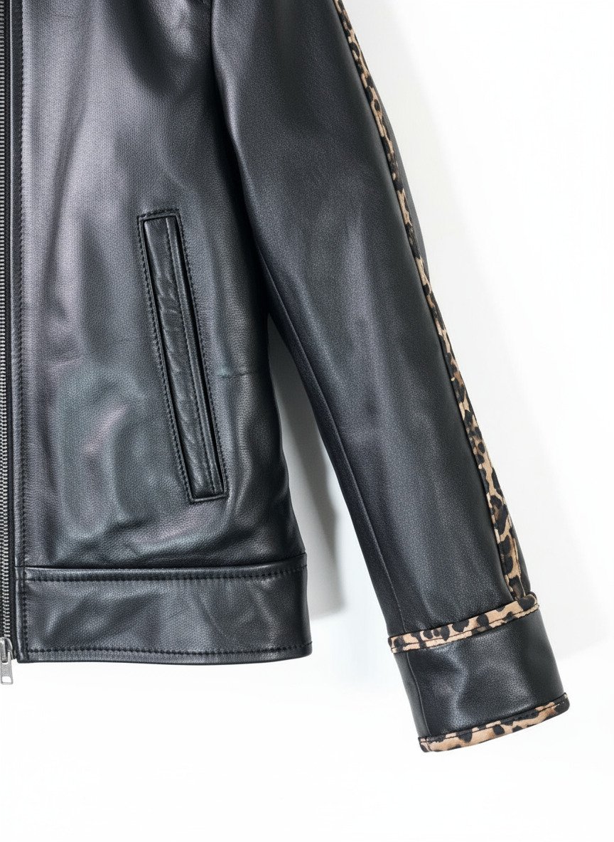 close-up of leopard print leather collar and chest pocket on sheep napa leather jacket