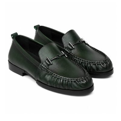 Handcrafted calf leather loafer with sleek metal detail and leather sole. Elegant, durable, and designed for refined everyday wear.