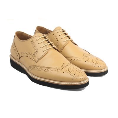 Sandstone Wingtip Oxford by Shoe Bespoke handcrafted in beige calf leather with black rubber sole.